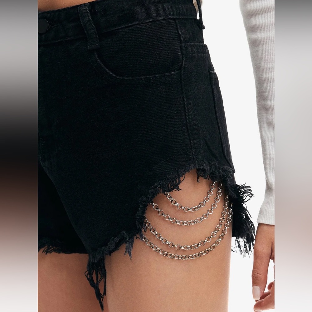 Black denim frayed shorts with chains